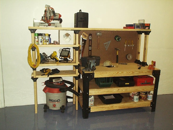 Shop workbench & shelving unit, using (1) 2x4basics Workbench Legs Kit, &  (10) 2x4basics ShelfLinks, plus 2x4's & particle boards. Customer Image