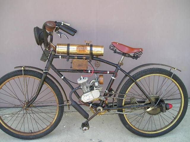 Moped Photo Gallery - 1915 style clip on motor kit bicycle | Powered bicycle,  Gas powered bicycle, Motorcycle camping gear