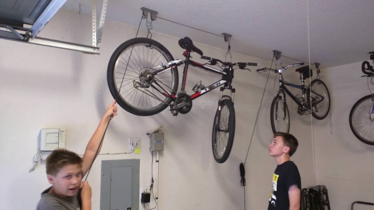 Ceiling Mounted Bike Lift | Bicycle storage rack, Bike lift, Bicycle storage